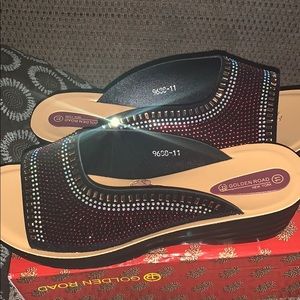 Sandals with a kind of high heels never Worn